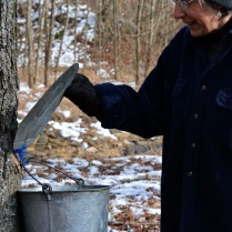 Valerie checking a bucket